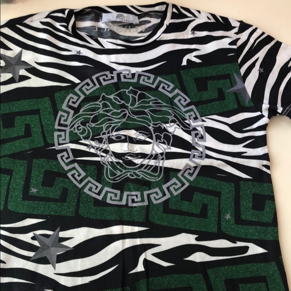 Young Versace T-shirt Kids size 6 does run small.